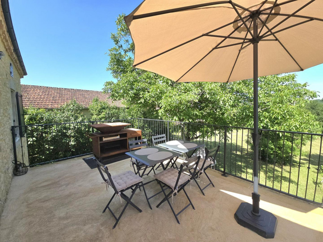 Terrasse privative donnant sur le jardin.